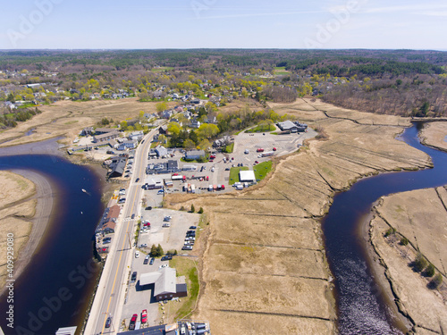 Essex historic town center on Main Street and Essex River swamp aerial view in spring in Cape Ann, Massachusetts MA, USA. 