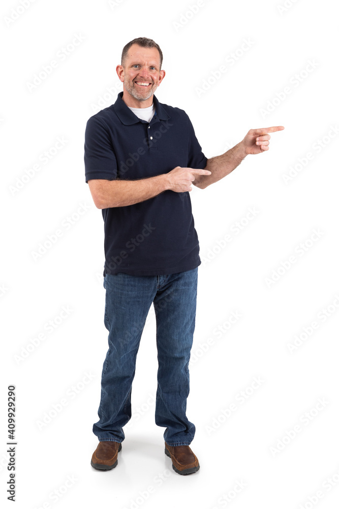 Casual Male Pointing To Side While Looking At Camera Casual Male Pointing To Side While Looking At Camera