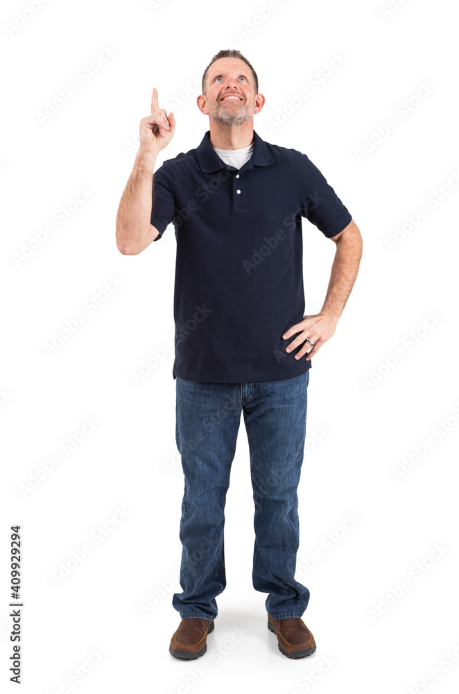 Smiling Casual Male Pointing Upwards Smiling Casual Male Pointing Upwards