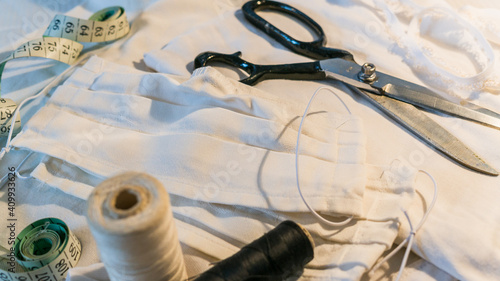 White homemade medical mask in the process