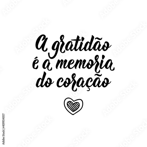 Gratitude is the memory of the heart in Portuguese. Lettering. Ink illustration. Modern brush calligraphy.