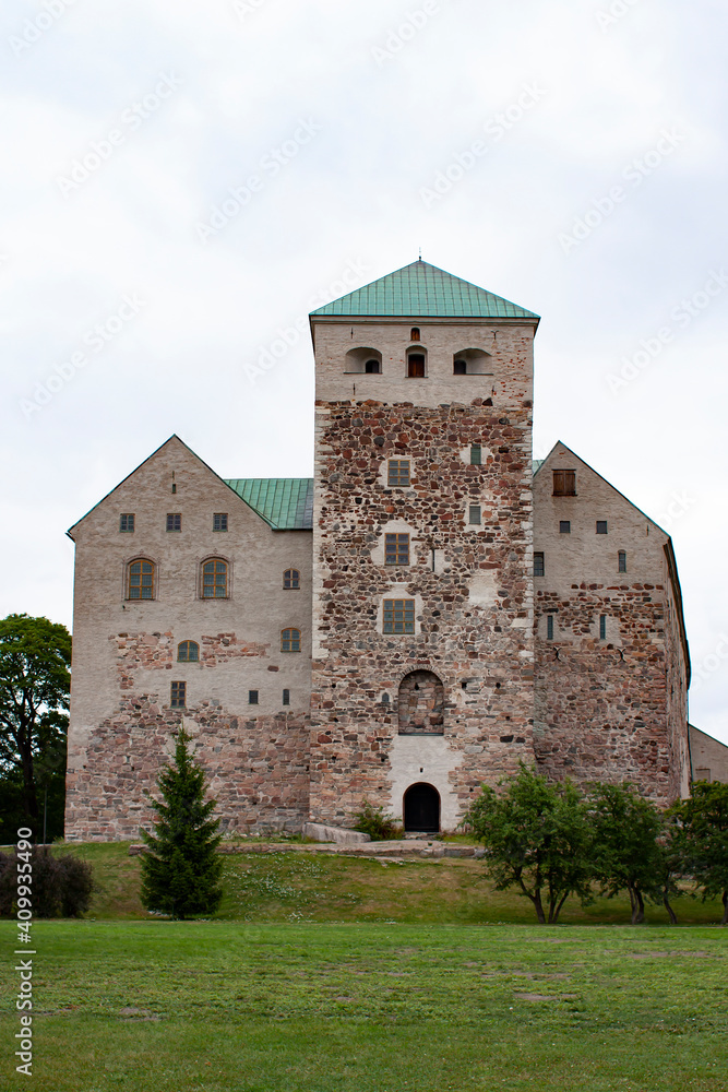 Turku castle that is the largest surviving medieval building in Finland seen from the port of Turku