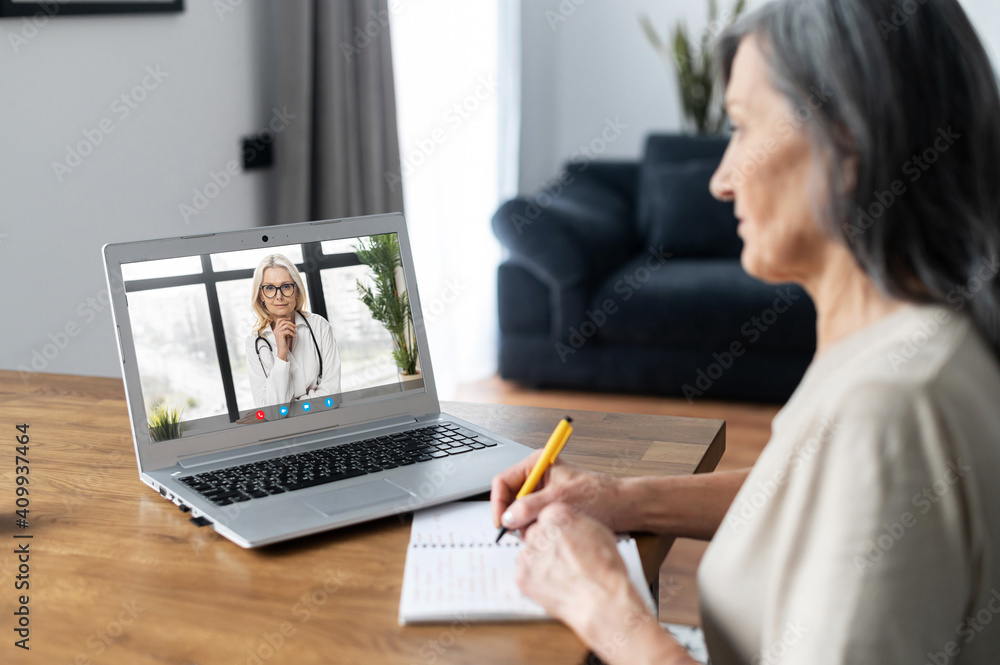 Video conference with a doctor, video consultation online. A female doctor, therapy recommends treatment, advises herapy to senior woman via video connection. Telemedicine concept Video conference with a doctor, video consultation online. A female doctor, therapy recommends treatment, advises herapy to senior woman via video connection. Telemedicine concept