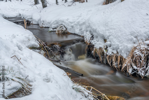 Olsovy creek near Petrovice village in Krusne mountains in winter cold morning