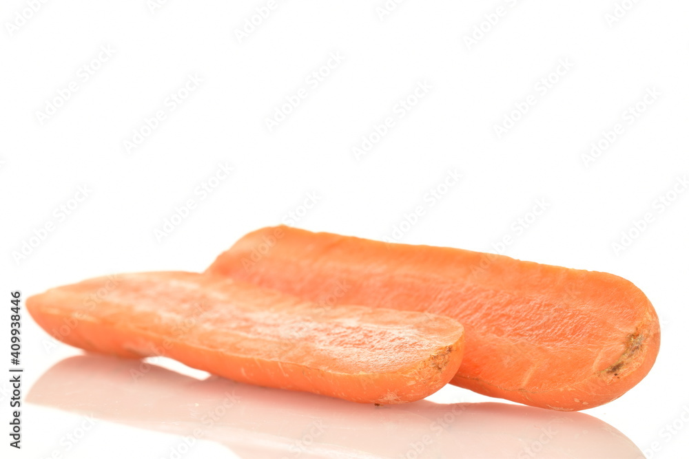 One ripe organic, unpeeled carrot, cut in half, close-up, isolated on white. One ripe organic, unpeeled carrot, cut in half, close-up, isolated on white.