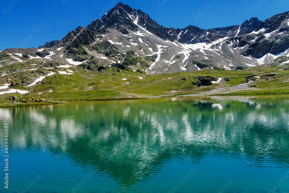 Fototapeta premium Passo Gavia, mountain pass in Lombardy, Italy, at summer. Lake
