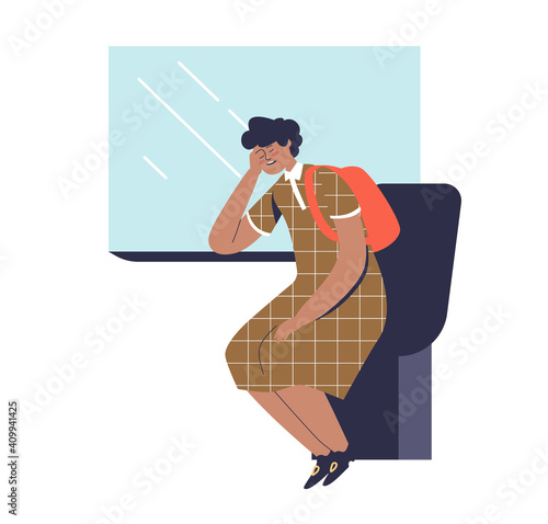 Woman sleep sitting at her seat near window while travelling by train. Tired female passenger