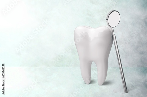 Human s white tooth and dentist mirror
