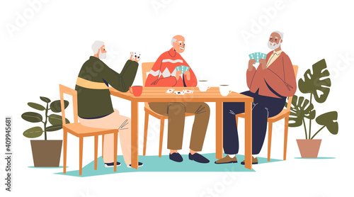 Group of senior men sitting together at table and playing cards, bridge or poker