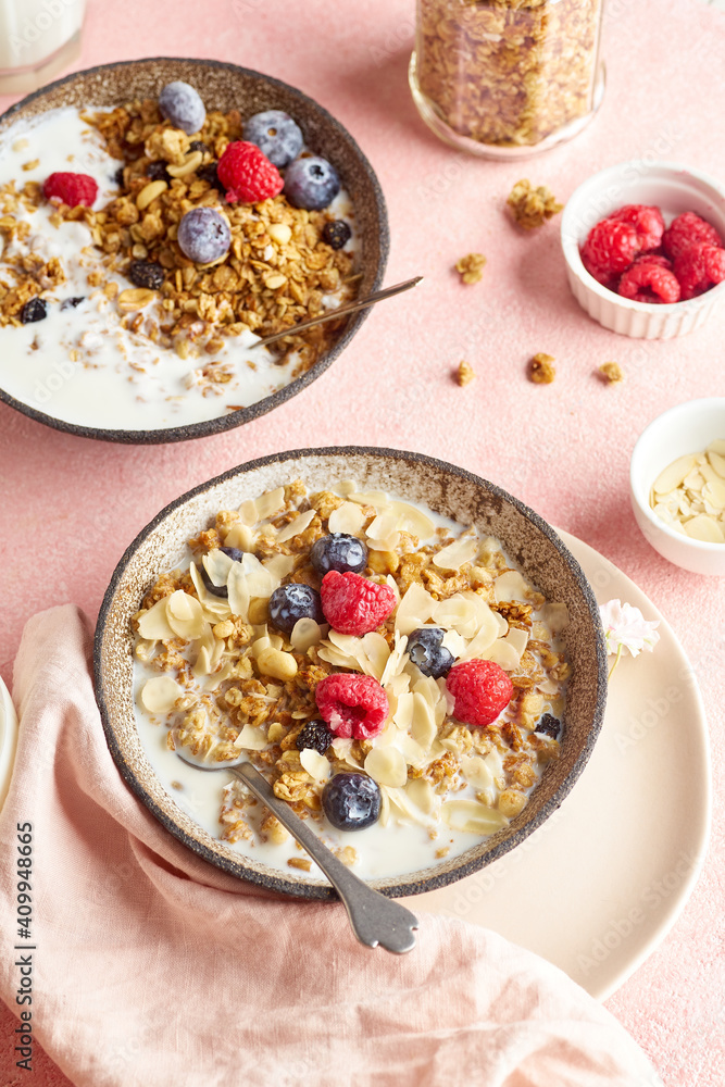 Top view of tasty breakfast with granola, berries and milk Top view of tasty breakfast with granola, berries and milk