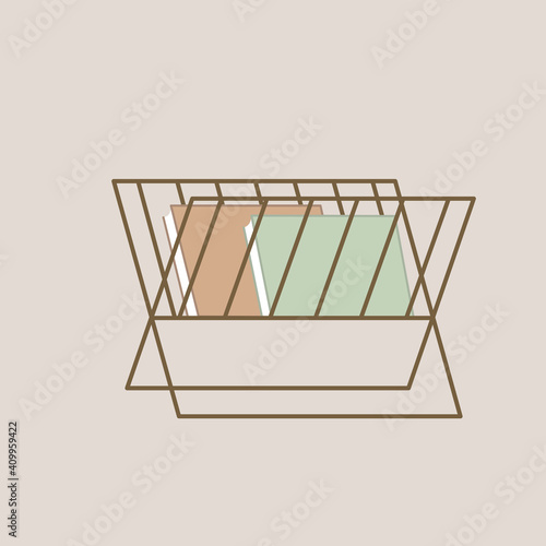 Magazine basket with magazines in the form of a grid on a light background.