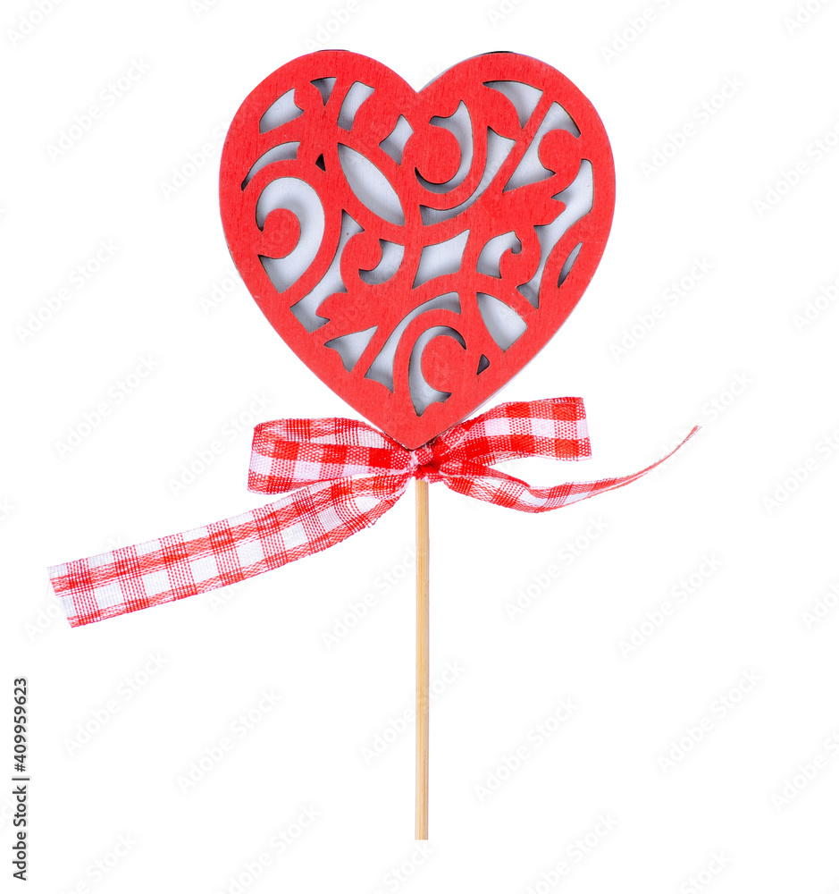 red heart on a stick decoration on white background isolation