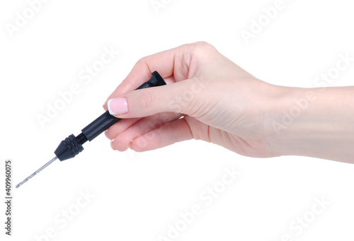 Mini hand drill in hand on white background isolation