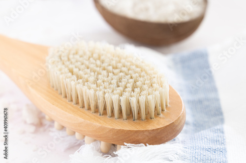 Sea salt   towel  massage wooden brush on white background