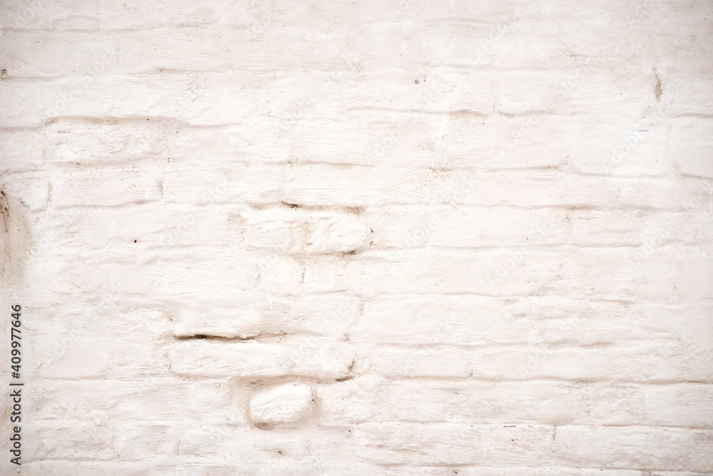 Fototapeta premium an old white brick wall. ancient building