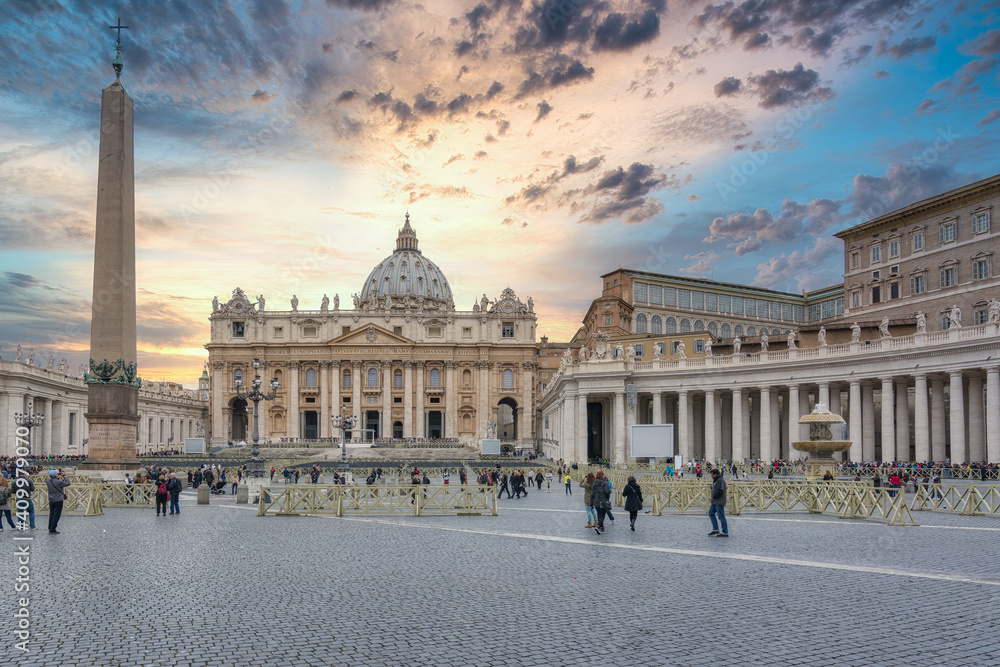 Tourists in Saint Peter's Basilica and square at sunset, Vatican City, Rome, Italy