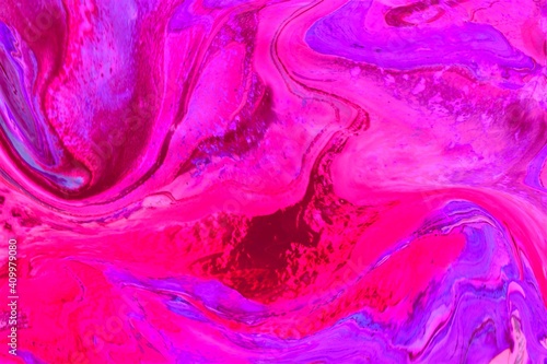 Abstract marble purple-blue-pink background. The effect of natural stone. Acrylic paint flows freely and creates an interesting pattern. Bright colors. Background for web design, notepad cover, notepa photo