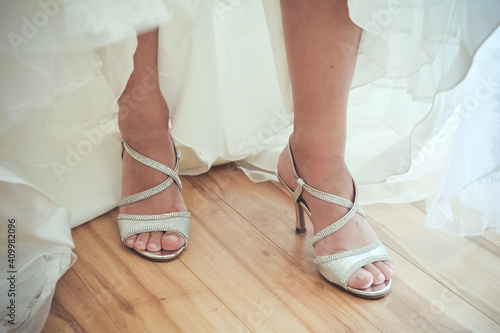 Woman feet with high heels for a wedding