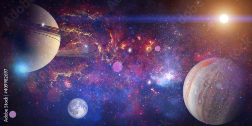 Fototapeta Naklejka Na Ścianę i Meble -  Space wallpaper banner background. Stunning view of a cosmic galaxy with planets and space objects. Elements of this image furnished by NASA.