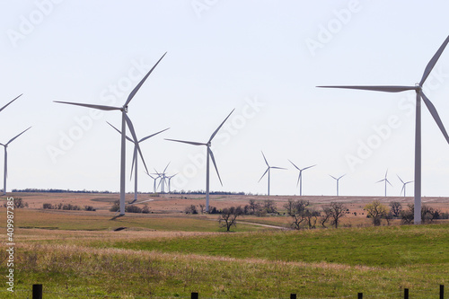 O'Neill, Nebraska, US July 22, 2019 Wind Farm In Nebraska Farm Land Wind Power Turbine Up Close. High quality photo