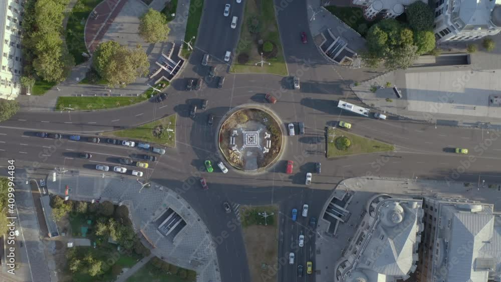 Top down aerial view of vehicles on busy roundabout junction in Bucharest, Romania Top down aerial view of vehicles on busy roundabout junction in Bucharest, Romania