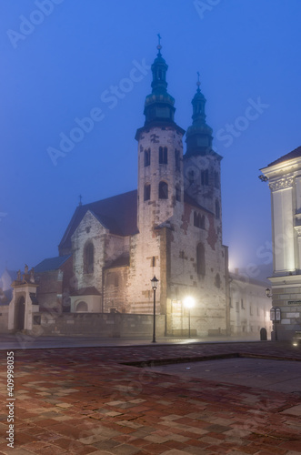 Krakow old town, St Andrew church on Grodzka street in the foggy night