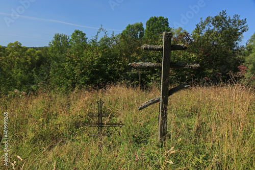 Old cemetery in abandoned village Lupkow in Bieszczady Mountains, Poland