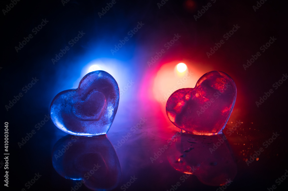 Valentines background. Valentine's Day heart on a dark wooden table. Toned, copy space Valentines background. Valentine's Day heart on a dark wooden table. Toned, copy space