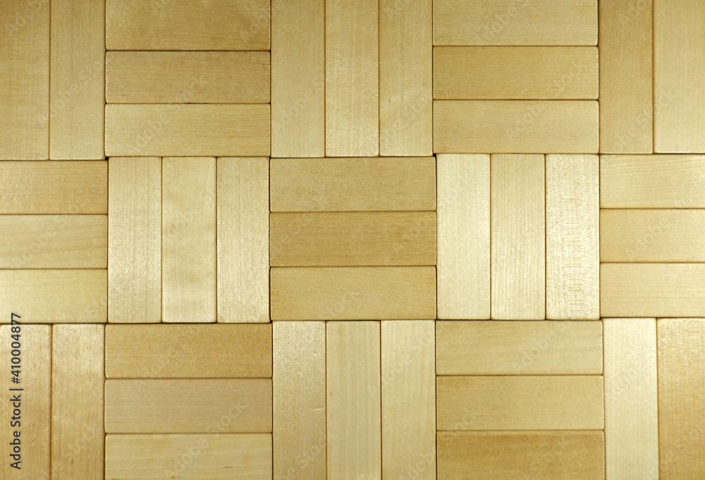 texture of light wooden blocks arranged in a checkerboard pattern texture of light wooden blocks arranged in a checkerboard pattern