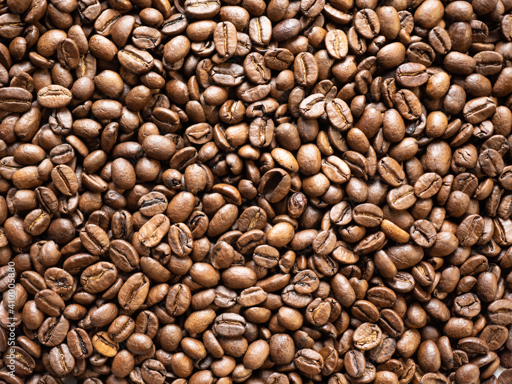 Roasted coffee beans. Flat lay, top view. Roasted coffee beans. Flat lay, top view.