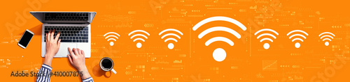 Картината върху платно Wifi theme with person using a laptop computer