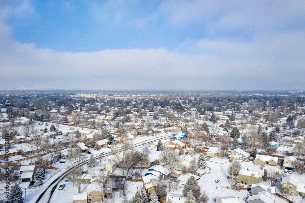 residential area of Fort Collins in northern Colorado, aerial view of winter scenery with fresh snow