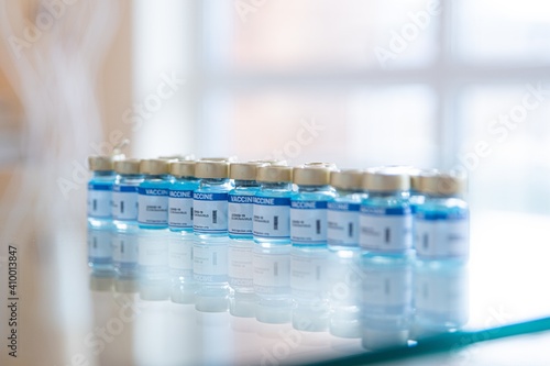 Some ampoules with vaccine. Glass vials medical close-up.
