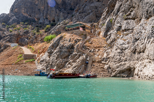 Kemaliye, Erzincan, Turkey-September 19 2020: Bout touring in  Dark Canyon (Karanlik Kanyon in Turkish). Euphrates River in Turkey.. photo