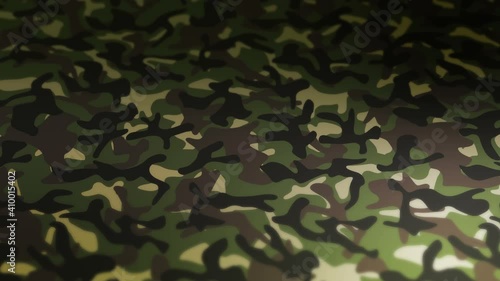 Green camouflage pattern background. Military uniform concept. Abstract line and wave texture. Loop animation.
