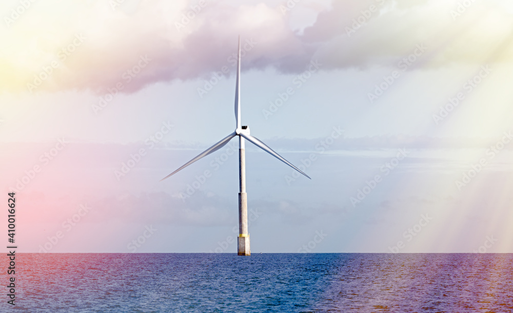 wind turbine in the sea, with sky and clouds