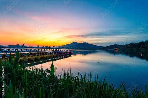 Xuanwu Lake and Zijin Mountain in Nanjing City at Sunrise in Summer. photo