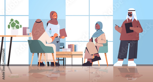 arabic businesspeople working and talking together in coworking center business meeting teamwork concept modern office interior horizontal full length vector illustration