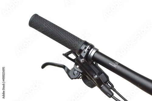 Canvastavla Handlebar of a mountain bike with brake, gear shifter, and a grip isolated