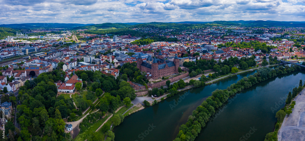 Aeriel view of the city Aschaffenburg in Germany on a cloudy noon in spring.	