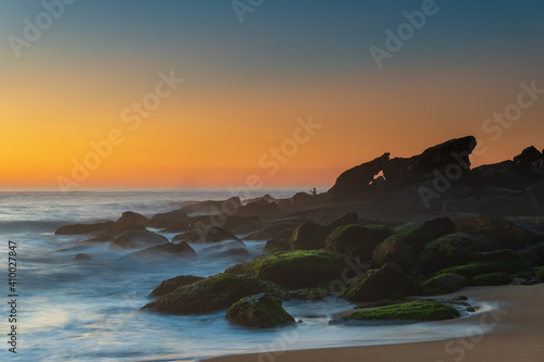 Sea Mist and Rocks, Sunrise Seascape with Fisherman