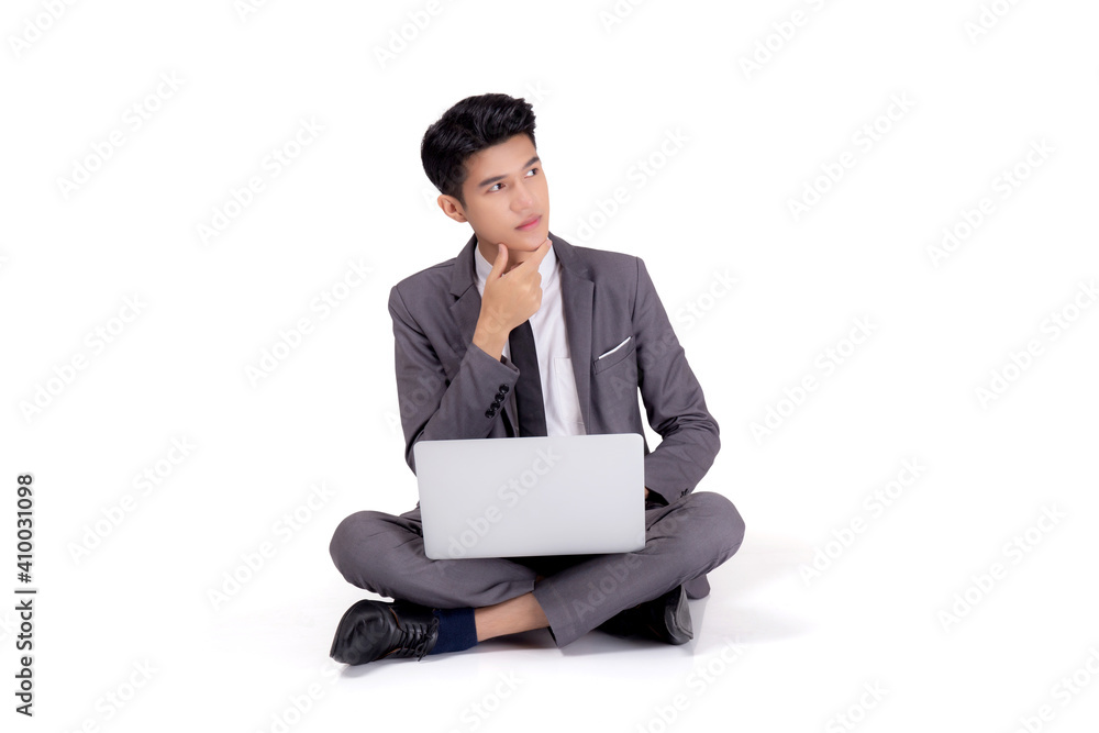 Young asian business man sitting thinking and work on laptop computer to internet online isolated on white background, businessman with notebook, freelance with success, marketing and communication. Young asian business man sitting thinking and work on laptop computer to internet online isolated on white background, businessman with notebook, freelance with success, marketing and communication.