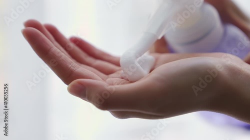 Wallpaper Mural Close-up of hands press the alcohol bottle to clean, Prevent the virus and disease from touching various objects in daily life. Torontodigital.ca