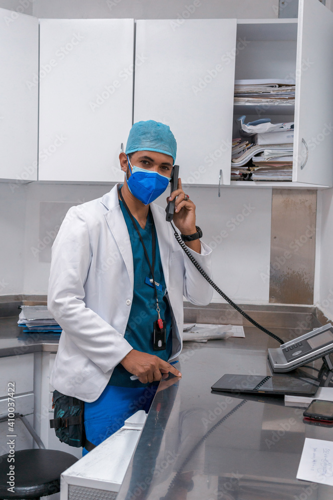 Fototapeta premium doctor talking on the phone in hospital