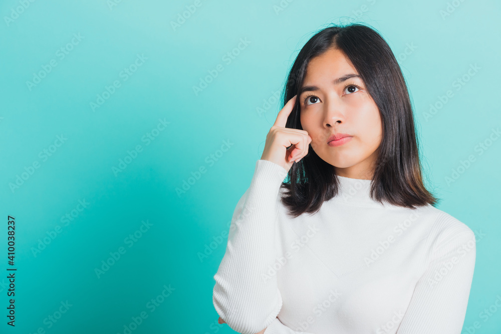 woman hand near the face and thinking woman hand near the face and thinking