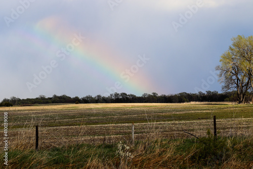 Nature Rainbow over pretty green Nebraska landscape. High quality photo