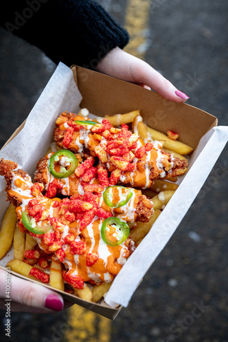 Korean fried chicken tender with spicy chips and sauce