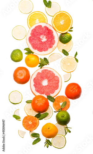 Citrus background. Fresh citrus fruits - Lemons  oranges  limes  grapefruits on the white background
