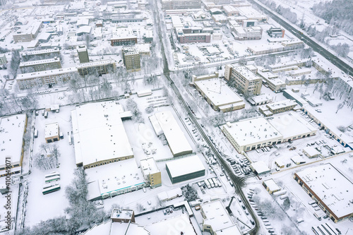 city industrial area in winter foggy weather. panoramic aerial view