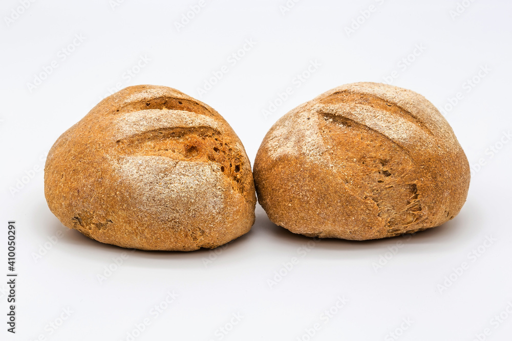 Rye bread on a white plate.